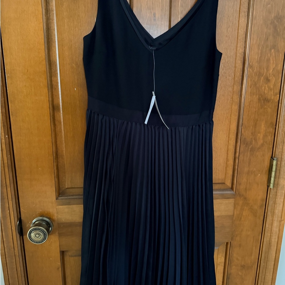 New with tags, banana republic size 4, petite Black Pleated Dress